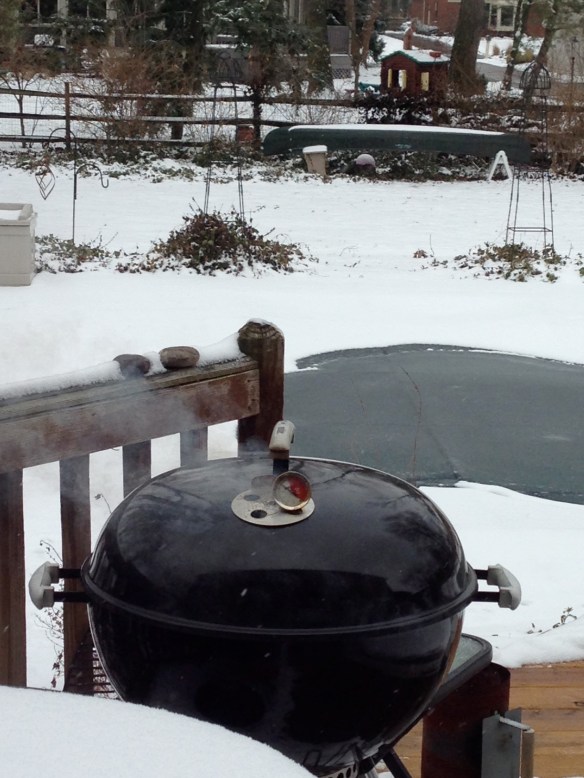 baby back ribs in weber grill smoking