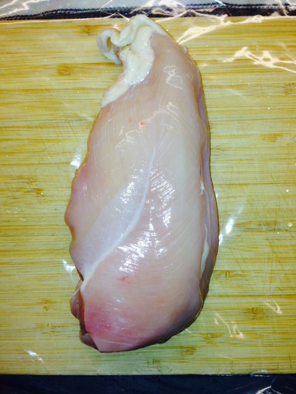 Put one hand on top of the chicken to hold it steady while slicing